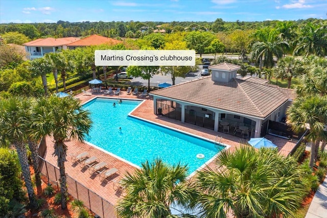 pool featuring a patio and fence