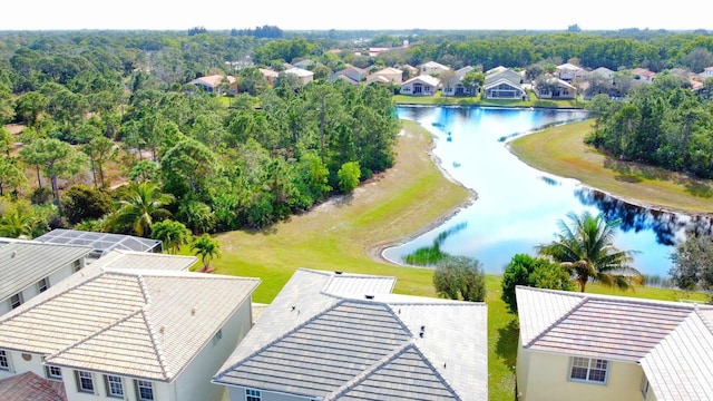 aerial view featuring a residential view and a water view