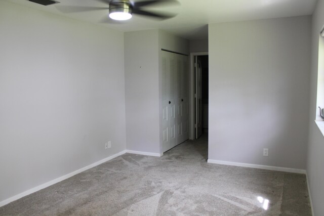 full bathroom featuring bath / shower combo with glass door, vanity, and toilet