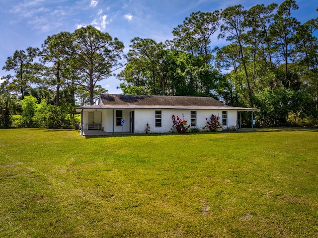 ranch-style house with a front yard