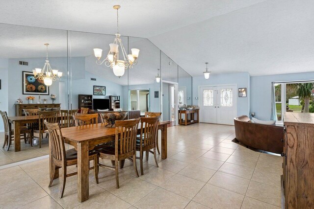 rec room with baseboards, visible vents, and light tile patterned floors