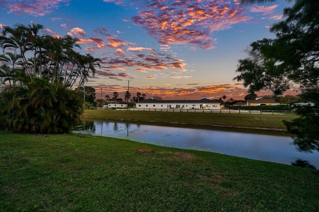 water view featuring fence