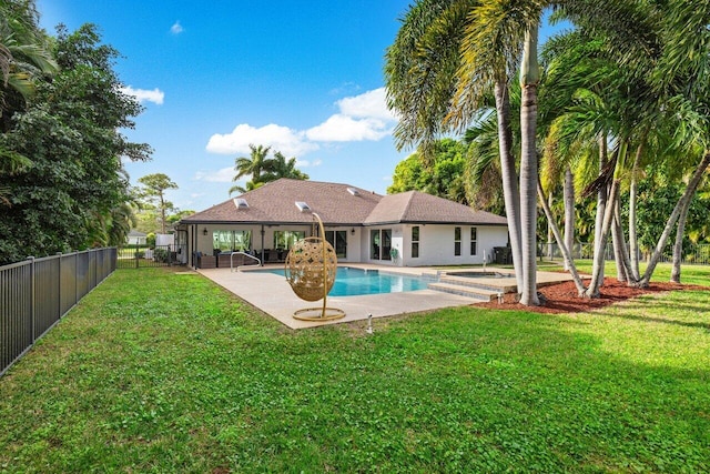 view of pool featuring a fenced in pool, a fenced backyard, a patio area, and a yard