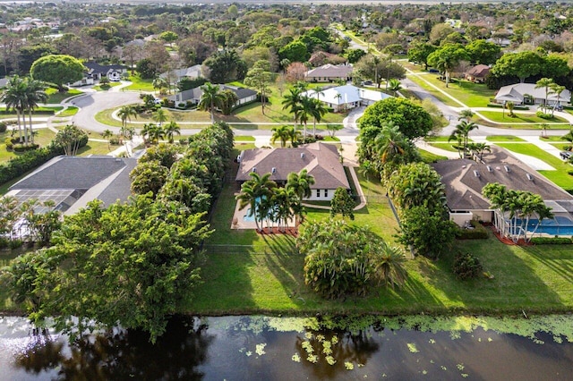 aerial view with a residential view and a water view