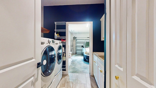 washroom with washer and clothes dryer