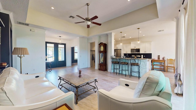 living room featuring ceiling fan