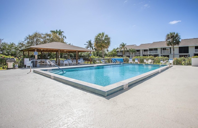 view of pool featuring a patio area and a gazebo