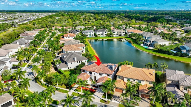 aerial view featuring a water view and a residential view