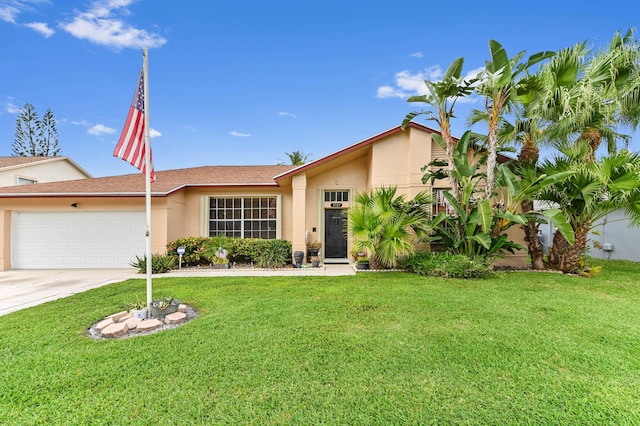 view of front of property featuring driveway, a front yard, a garage, and stucco siding