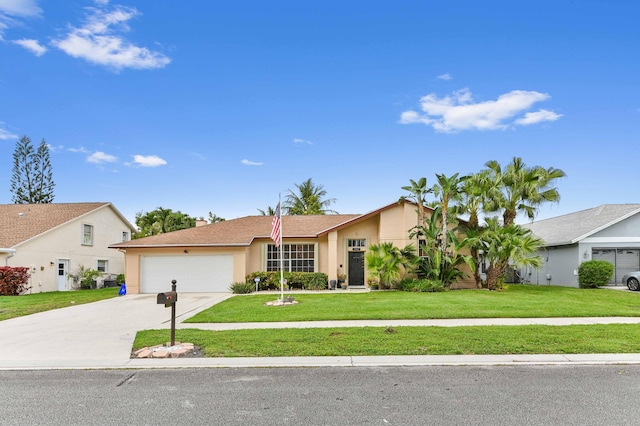 view of front of house featuring a garage, concrete driveway, a front lawn, and stucco siding