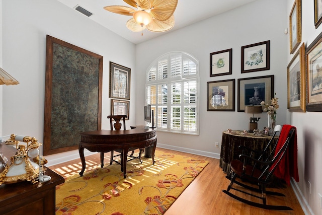 office with visible vents, light wood-style flooring, and baseboards