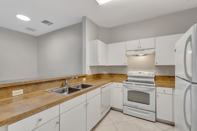 kitchen with a sink, light countertops, under cabinet range hood, white appliances, and white cabinets