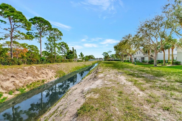 view of yard with a water view