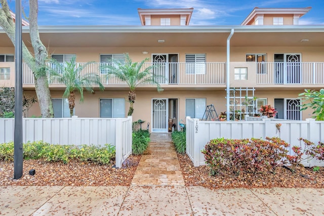 view of property with a fenced front yard