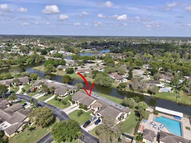 aerial view featuring a water view and a residential view