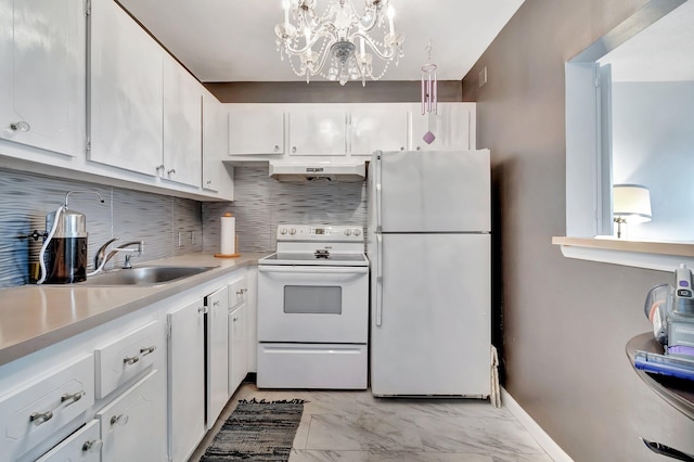 kitchen with marble finish floor, light countertops, white cabinets, a sink, and white appliances