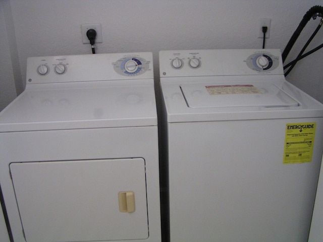 laundry area featuring independent washer and dryer