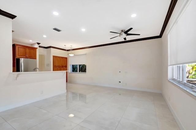 unfurnished living room with ceiling fan, recessed lighting, visible vents, baseboards, and ornamental molding