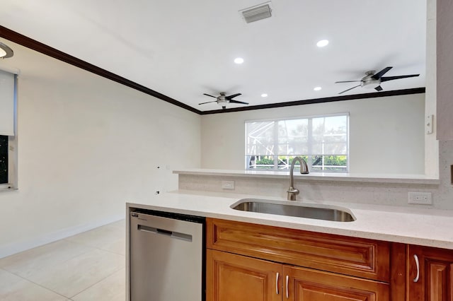 kitchen featuring a sink, visible vents, stainless steel dishwasher, and ornamental molding