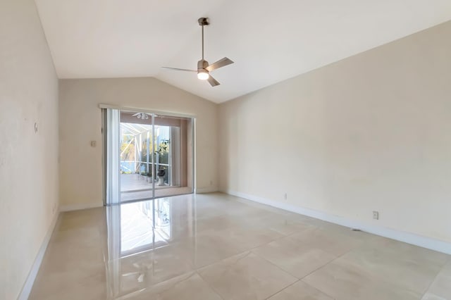 unfurnished room with baseboards, vaulted ceiling, a ceiling fan, and light tile patterned flooring