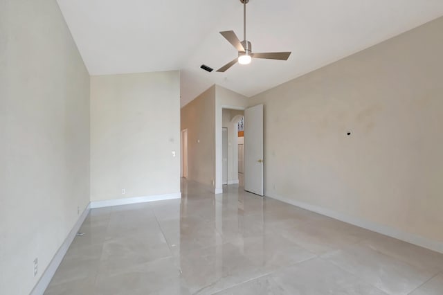 unfurnished bedroom with ceiling fan, visible vents, baseboards, and vaulted ceiling