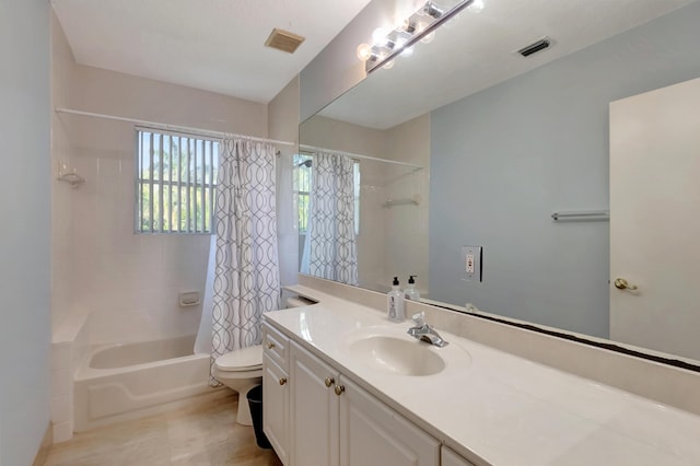 full bathroom featuring toilet, vanity, visible vents, and shower / bathtub combination with curtain