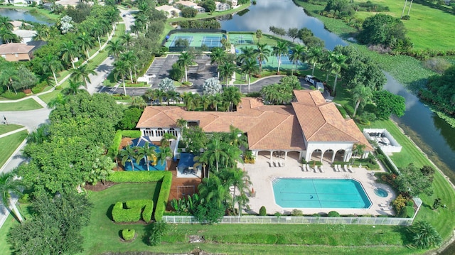 birds eye view of property featuring a water view