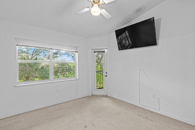 1820 SE Hideaway Cir Unit 1820, Port Saint Lucie, FL 34952 - spare room with a ceiling fan, carpet flooring, and baseboards