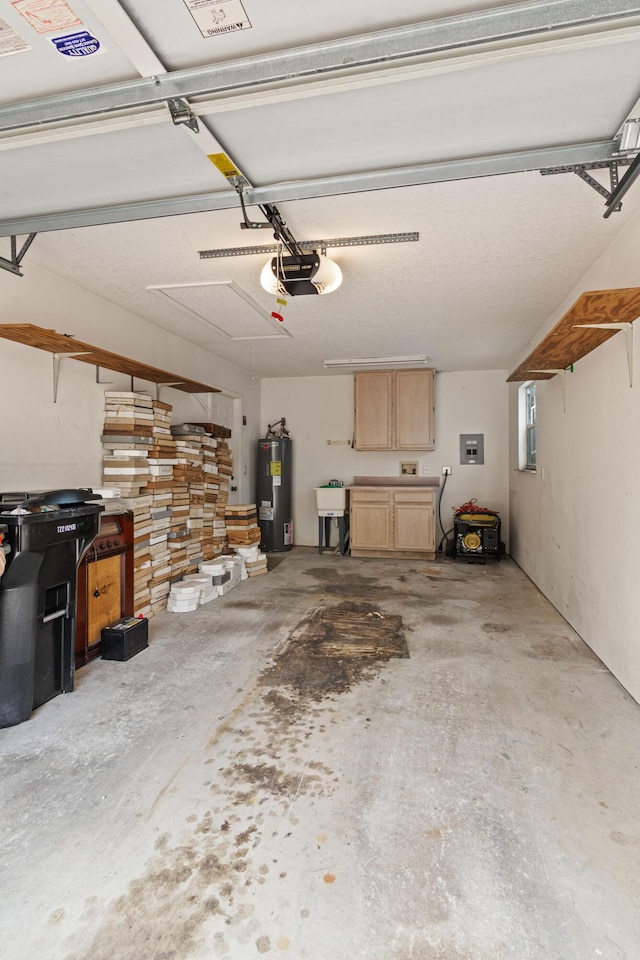 1820 SE Hideaway Cir Unit 1820, Port Saint Lucie, FL 34952 - garage featuring a garage door opener, electric water heater, and a sink