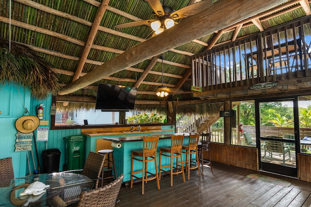 1820 SE Hideaway Cir Unit 1820, Port Saint Lucie, FL 34952 - exterior space featuring wood-type flooring, wooden walls, ceiling fan, and a community bar
