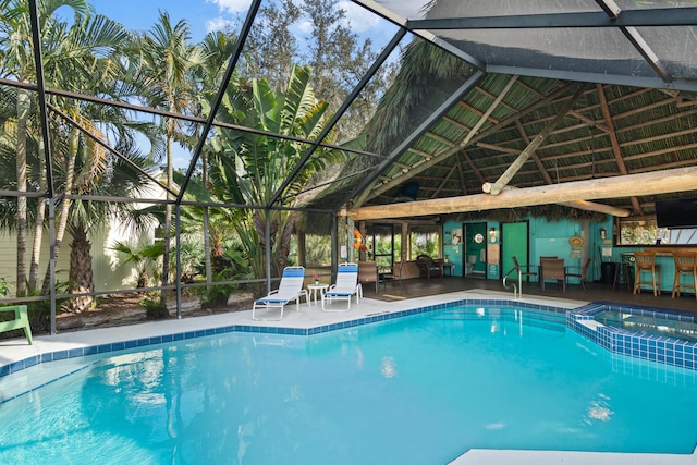 1820 SE Hideaway Cir Unit 1820, Port Saint Lucie, FL 34952 - view of pool with a lanai, a patio area, and a pool with connected hot tub