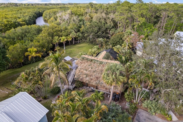 1820 SE Hideaway Cir Unit 1820, Port Saint Lucie, FL 34952 - birds eye view of property featuring a wooded view
