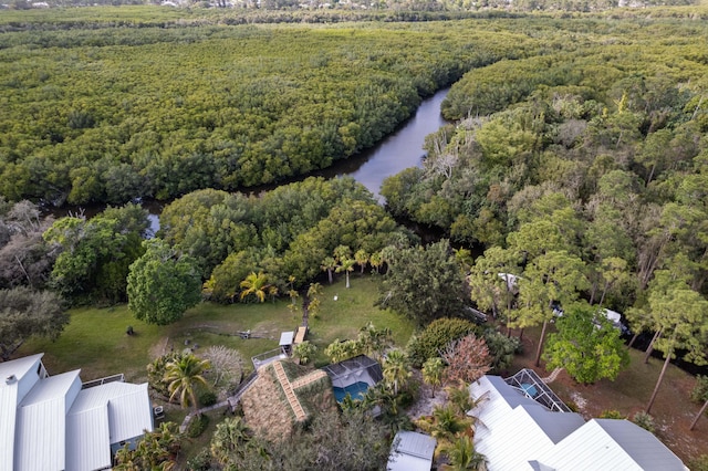 1820 SE Hideaway Cir Unit 1820, Port Saint Lucie, FL 34952 - aerial view featuring a water view and a wooded view
