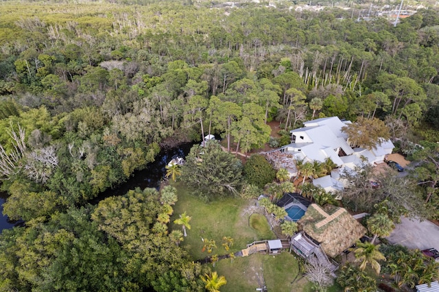 1820 SE Hideaway Cir Unit 1820, Port Saint Lucie, FL 34952 - aerial view featuring a wooded view