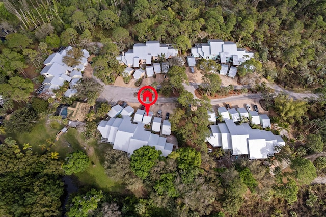 1820 SE Hideaway Cir Unit 1820, Port Saint Lucie, FL 34952 - bird's eye view featuring a wooded view and a residential view