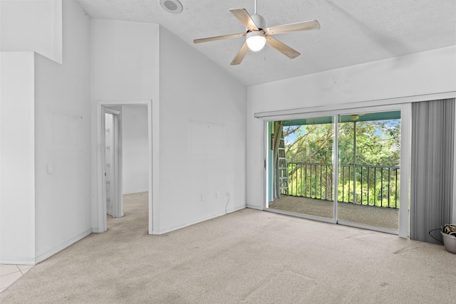 1820 SE Hideaway Cir Unit 1820, Port Saint Lucie, FL 34952 - unfurnished bedroom featuring access to exterior, baseboards, carpet, and a textured ceiling