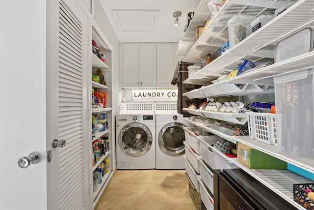 laundry area with laundry area and independent washer and dryer