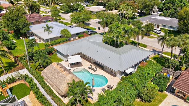 birds eye view of property with a residential view