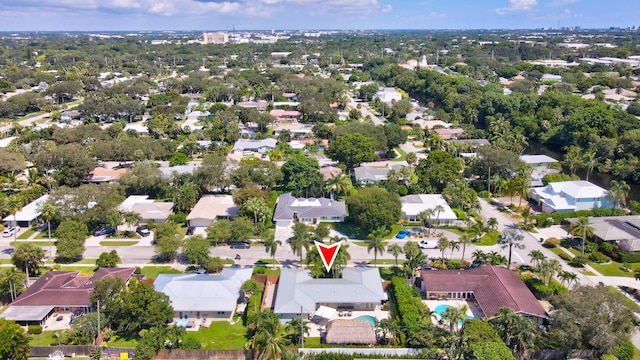 birds eye view of property with a residential view