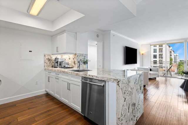 kitchen with light stone counters, dishwasher, dark wood-type flooring, white cabinets, and tasteful backsplash