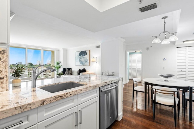 kitchen featuring sink, ornamental molding, stainless steel dishwasher, dark wood-type flooring, and white cabinets