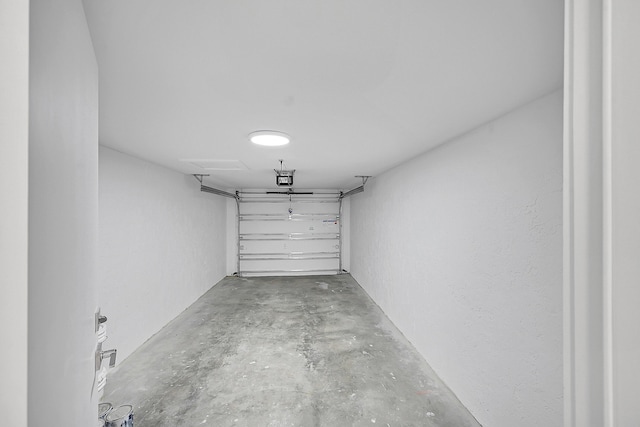 303 Sea Oats Dr Unit D, Juno Beach, FL 33408 - garage featuring a garage door opener