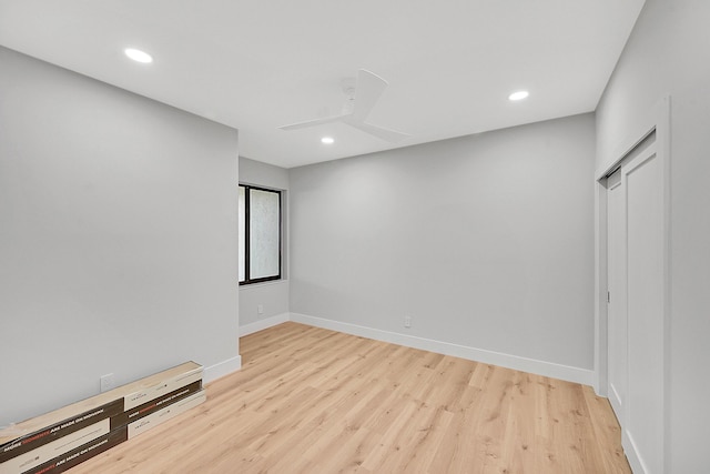 303 Sea Oats Dr Unit D, Juno Beach, FL 33408 - unfurnished room with wood finished floors, baseboards, recessed lighting, and a ceiling fan