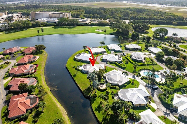 aerial view with a residential view and a water view