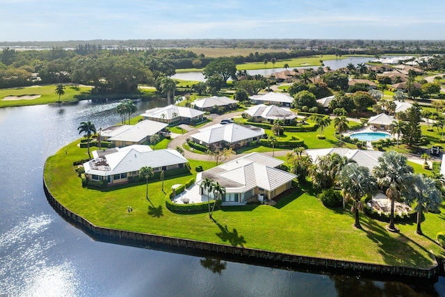 bird's eye view featuring a residential view and a water view