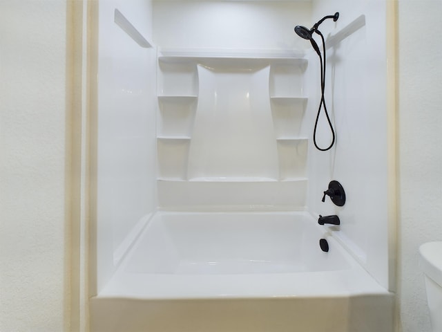 full bathroom with  shower combination and toilet