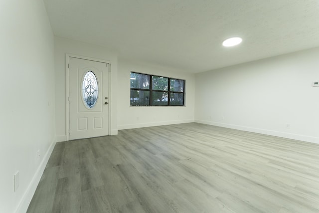 entrance foyer featuring light hardwood / wood-style floors