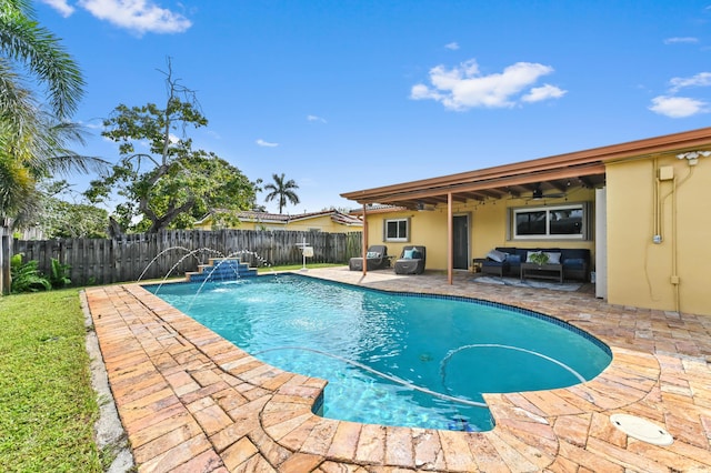 view of swimming pool with a fenced in pool, a ceiling fan, a patio, a fenced backyard, and an outdoor living space