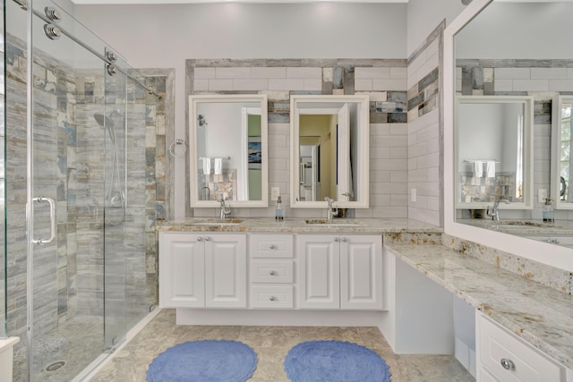 bathroom featuring vanity and walk in shower