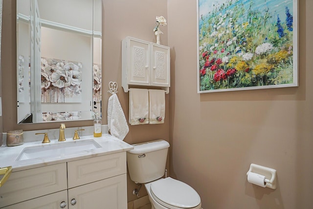 half bath with toilet and vanity